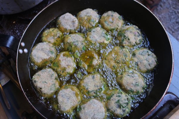 Mediterranean Diet: Frying Zucchini Fritters in Olive Oil