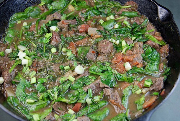 Mediterranean Diet: beef with spinach in skillet