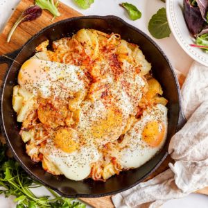 Mediterranean Skillet Potatoes with Poached Eggs