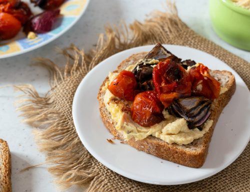 Hummus Toast with Roasted Cherry Tomatoes and Red Onion